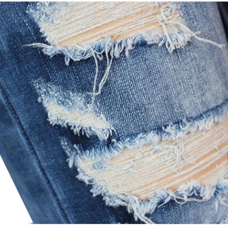 Redefine Casual: Ripped Jeans with Timeless Appeal