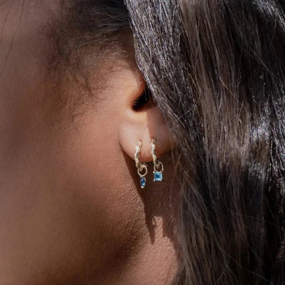 Captivate with Silver Zircon Drop Earrings